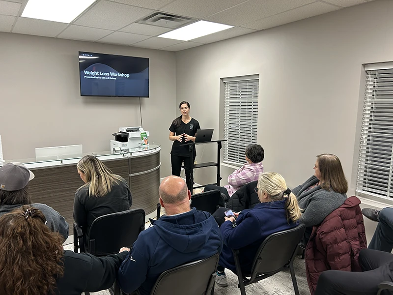 Chronic Illness Knoxville TN Kelsey Giving a Lecture at a Workshop